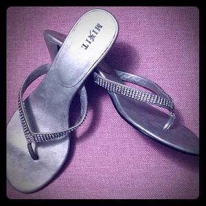 Size 8.5 silver heels. Gently used